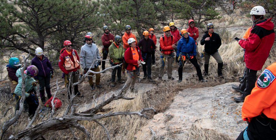 Prospective members of Larimer County Search and Rescue are briefed for field training as part of their Basic Search and Rescue Training course April 23. 