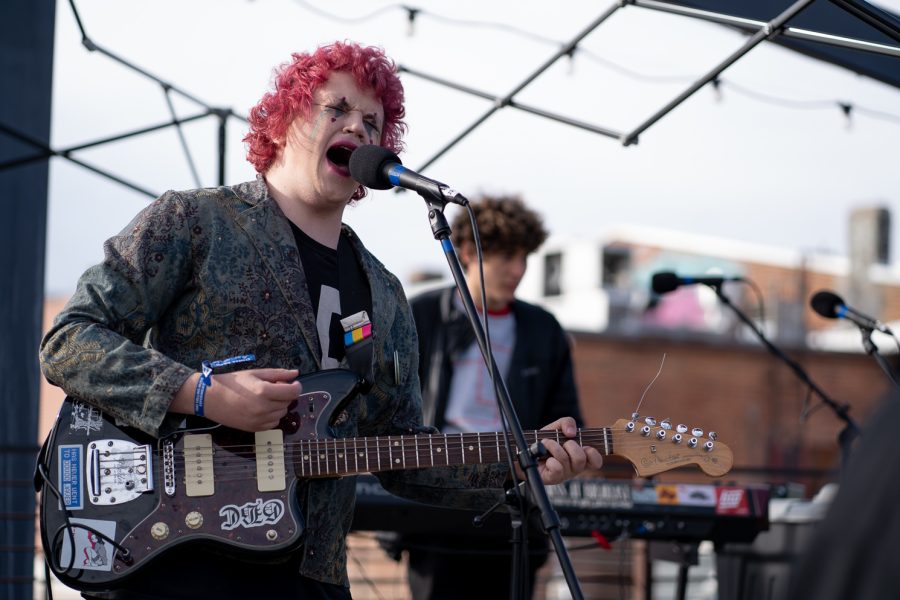 Jae Smith, lead singer, of the band Hotel Wifi sings an original song on the rooftop of Illegal Pete’s during Fort Collins Music Experience April 23. FoCoMX was a music festival hosted by Fort Collins Musicians Association showcasing 300 bands at 30 different venues over two days.