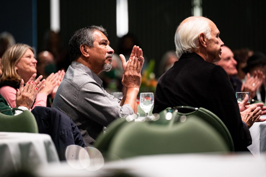 A community member applauds during Colorado State Universitys first vice president of diversity Mary Ontiveros memorial service in the Lory Student Center