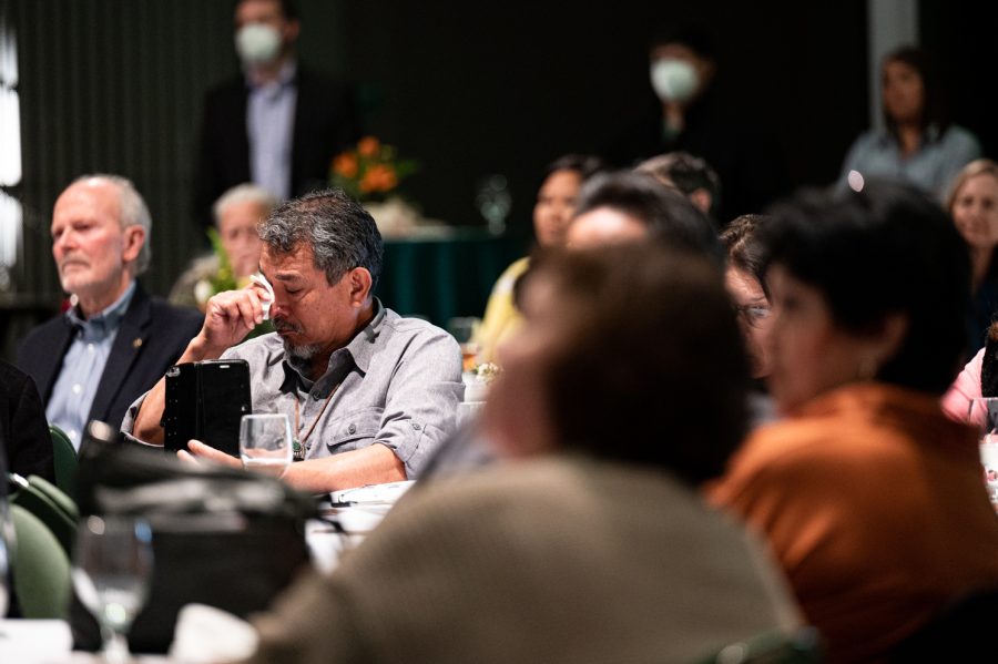 A community member cries during Colorado State University's first vice president of diversity Mary Ontiveros' memorial service in the Lory Student Center April