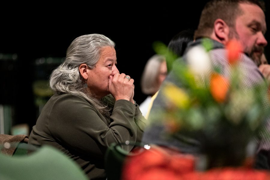 A community member listens closely during Colorado State Universitys first vice president of diversity Mary Ontiveros memorial service in the Lory Student Center