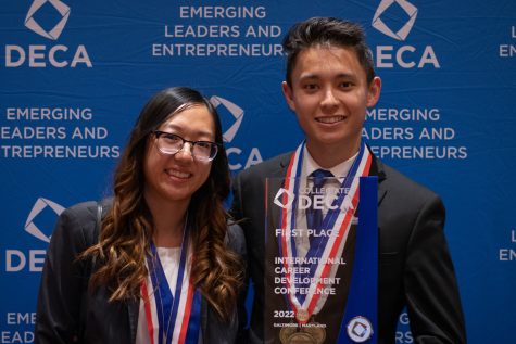 Nick Shipe and Jennifer Tran posing for a photo after the ICDC award ceremony.