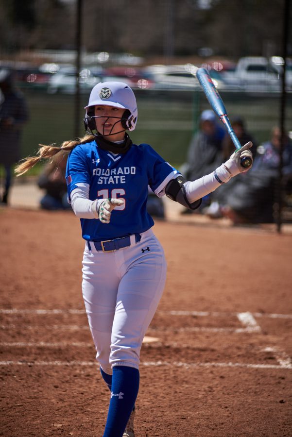 Senior, Kaitlyn Cook, steps out of the batters box to prepare for her next bat April 10, 2022.