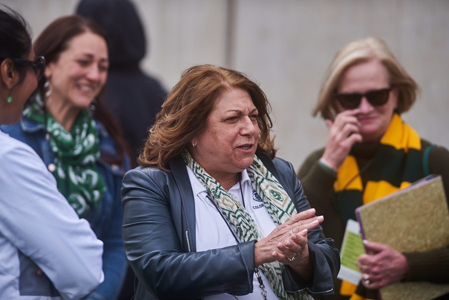 Joyce McConnell enters the stadium. Colorado State Rams play their spring game during green and gold weekend.