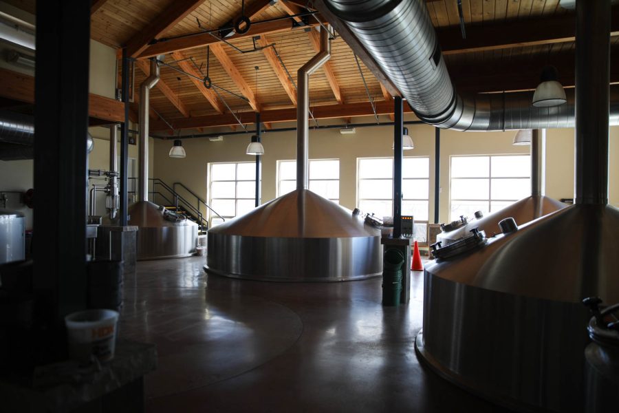 Fermentation machinery is housed in Odell Brewing Companys brewhouse April 10. This brewhouse is capable of making 300 kegs of beer every four hours when it runs at full capacity.