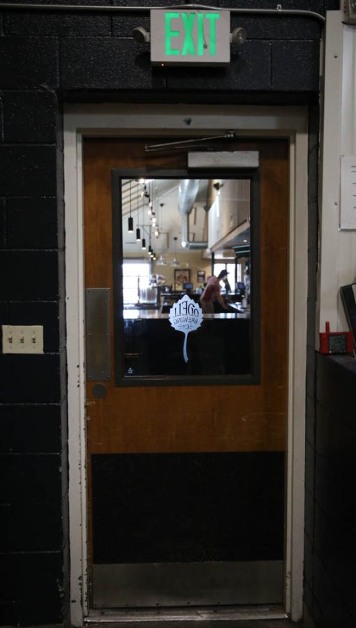 The public taproom is seen from the processing room at the Odell Brewing Company April 6.