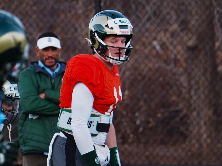 Sophomore quarterback Clay Millen (11) lines up to run a play at the Colorado State football morning practice March 31, 2022