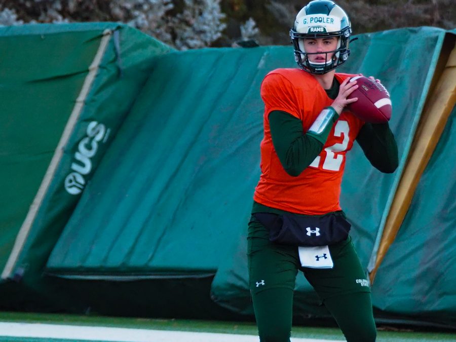 Quarterback looks to pass the ball