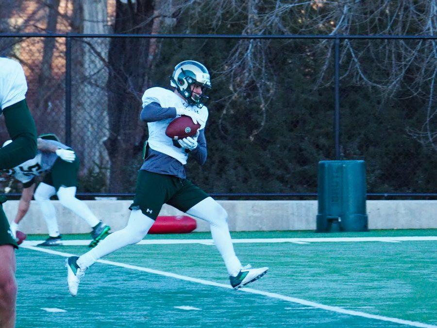 Redshirt Sophomore Brian Dolby (33) catches a pass at Colorado State football practice March 31, 2022.