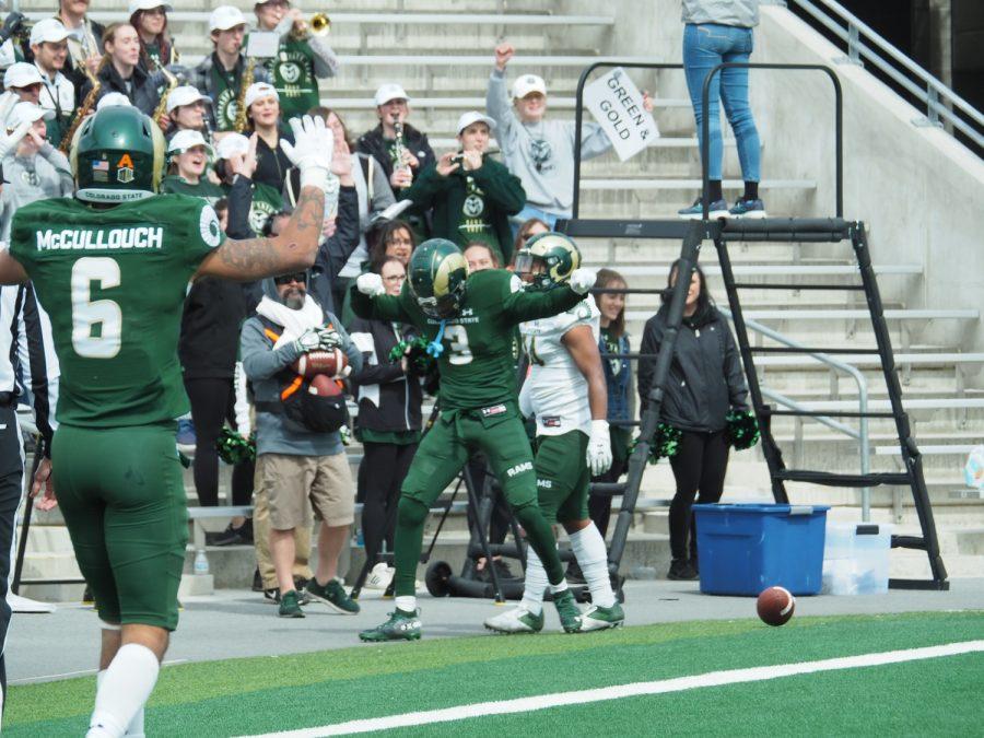 Colorado State wide receiver E.J. Scott celebrates a touchdown catch from a pass by Giles Pooler April 23.