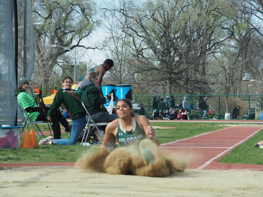 Colorado State Universiys Aailyah Robinson lands in the sand pit at the end of her triple jump at the Jack Christansen Invitational April 23.