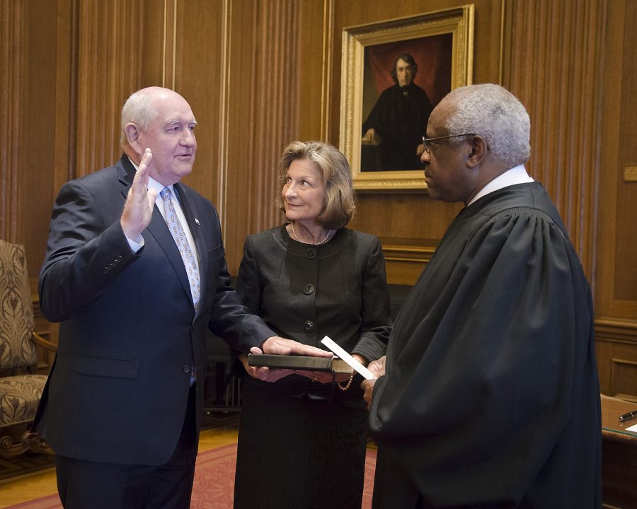 Sonny Perdue is sworn in as the 31st secretary of agriculture by U.S. Supreme Court Justice Clarence Thomas with Perdue's wife, Mary Ruff, and family at the Supreme Court in the District of Columbia April 25, 2017. (Photo courtesy of Preston Keres via Wikimedia Commons)