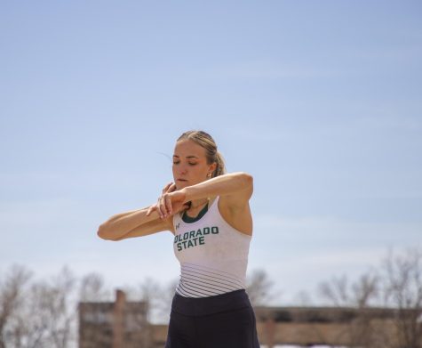 Lexie Keller prepares her throw for the shot put event at the Doug Max Invitational April 16, 2022. Keller made a personal record with this throw at 13.37 meters and came third in the event. 