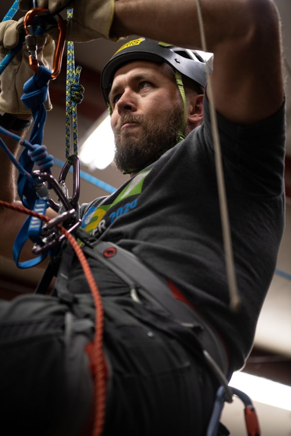 Chris Jones, a BASART, practices ascending and descending a rope at the LCSAR Cache April 20.