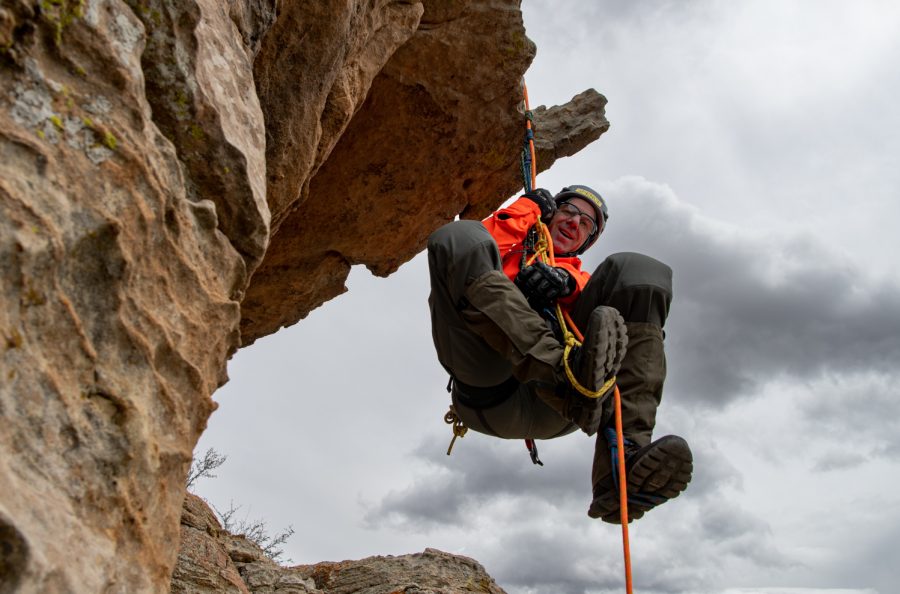 Spence Sedacca, a BASART, practices ascending and descending a rope on a 40 foot cliff with an overhang April 23.