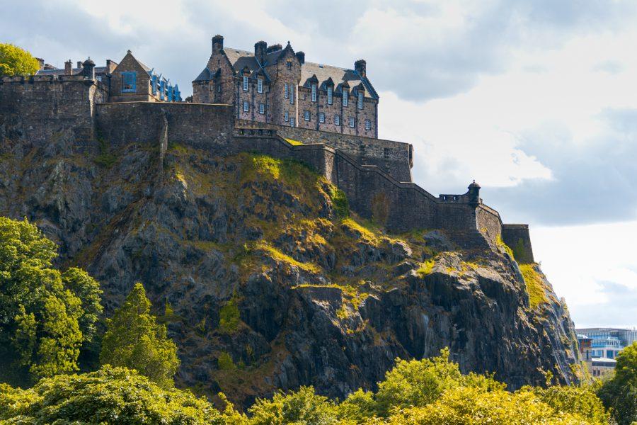 A stone castle on top of a hill