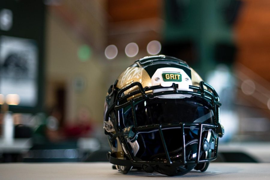 A Colorado State University football helmet sits on a table inside Canvas Stadium in Fort Collins Aug. 18.