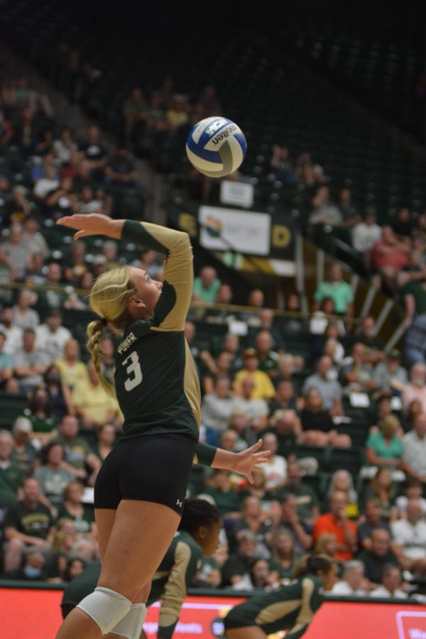 Colorado State setter Barrett Power (3) serves the ball against the University of California, Santa Barbara