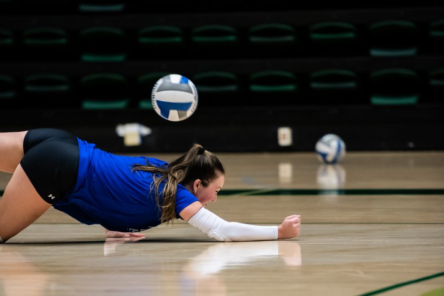 Colorado State outside hitter Jacqi Van Liefde dives for a ball during the Colorado State volleyball open practice Aug. 23.