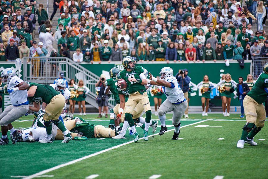 Defensive back Henry Blackburn (11) tries to keep the ball away from Marley Cook (57) during the Colorado State University football game against Middle Tennessee State University Sept. 10, 2022. The Rams lost 34-19.