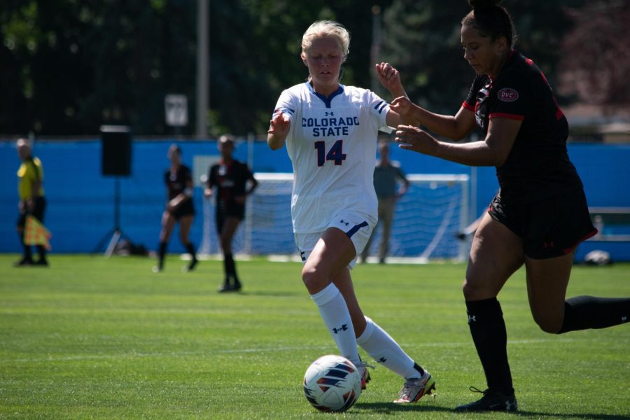 Colorado State forward Katy Coffin (14) steals the ball from Southeast Missouri defender Mariah Mannino during the first half of the home game on September 4th. The Rams went on to beat the Semos 2-0.