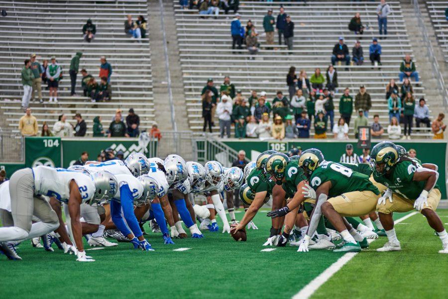 Members of the Colorado State and Middle Tennessee Football teams line up for a snap during their game Sept. 10.