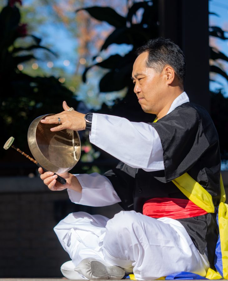 Jeonghun Kim, member of the First Korean Church of Fort Collins, performs for the audience with a kkwaenggwari