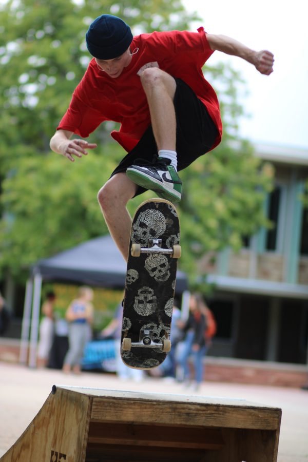 A Colorado State University student shows off his skateboarding skills at the CSU Skate Clubs first event