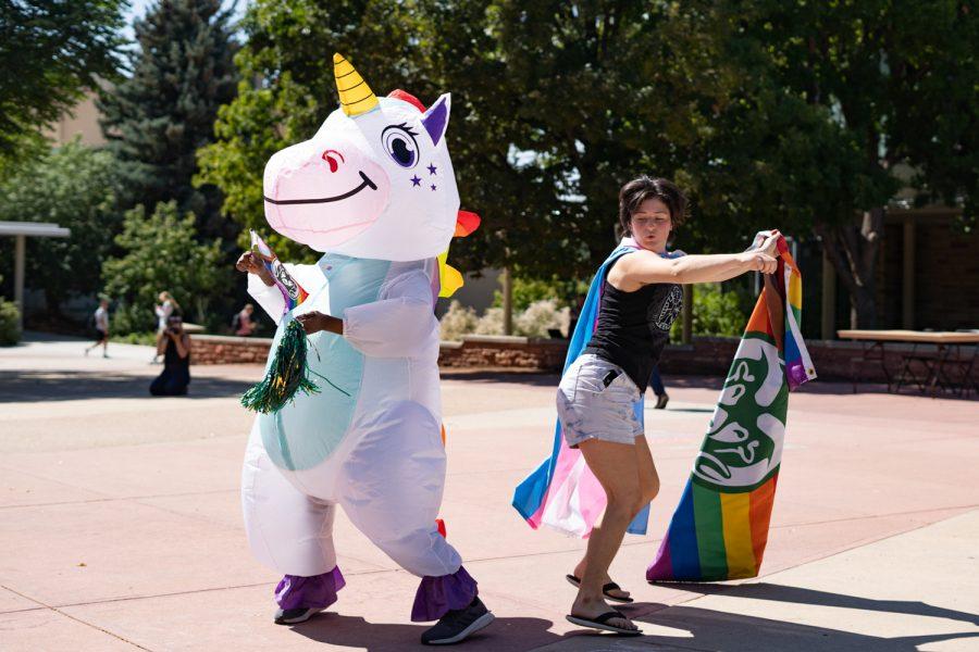 CSUnicorn+Task+Force+dance+in+The+Plaza+with+a+pride+flag+to+spread+joy+amid+the+presence+of+religious+and+anti-abortion+groups