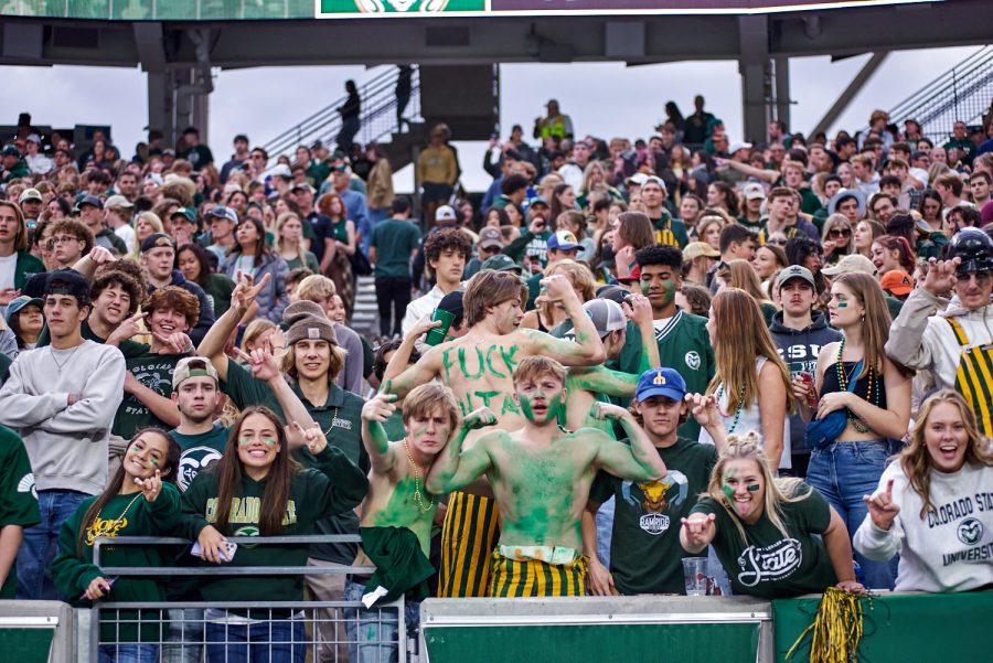 Colorado State University fans lose the top, Oct. 15. Losing the top and painting the body has been an iconic school spirit fashion item since the beginning of all college football.