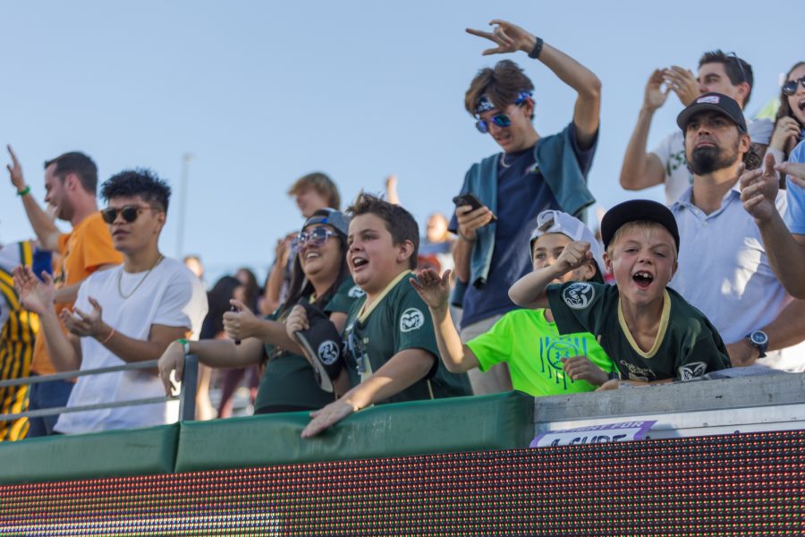 Colorado State University fans cheer after quarterback Avery Morrow scores the game-winning touchdown