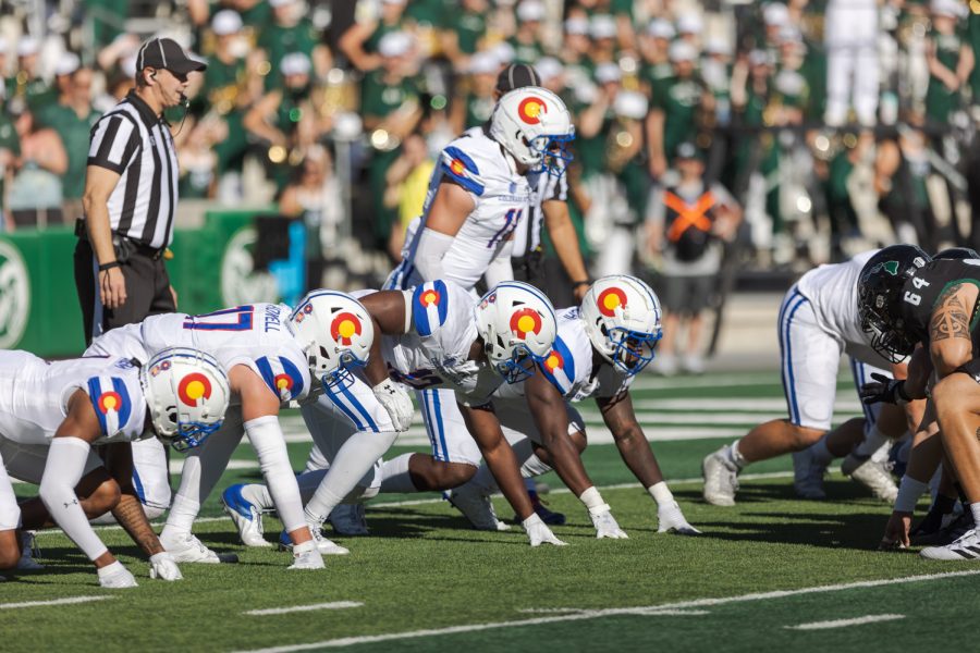 The Colorado State Universtiy football team lines up at the beginning of a play