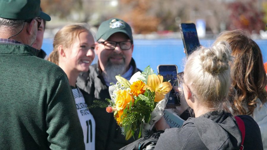 Colorado State senior midfielder Kaitlyn Abrams poses with family for senior day Oct 27.