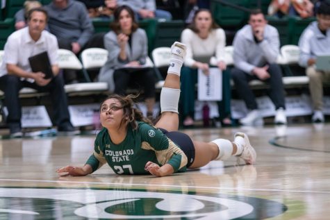 Helena Perez (27) watches the ball after saving it during the Colorado State University vs the University of New Mexico game