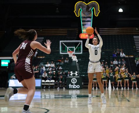 Colorado State University forward Kendyll Kinzer (0) attempts a 3-point shot at the Rams home game against the University of Montana Nov. 11, 2022. CSU won 82-58.