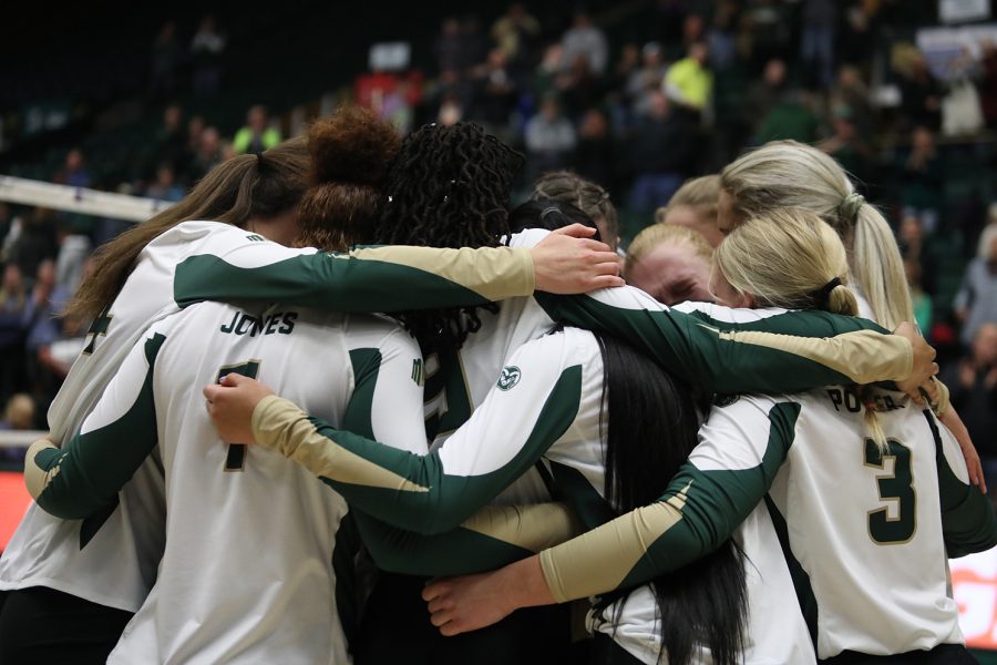 After a 3-2 loss in the quarterfinals of the Mountain West Volleyball Championship tournament, Colorado State University volleyball players hug each other as their season comes to a close Nov. 23. The Rams lost after five close sets against San Diego State University, in what was head coach Tom Hilberts final game of his career.