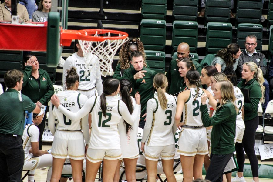 Head Coach Ryun Williams gets his players ready for the fourth quarter vs Colorado Christian University