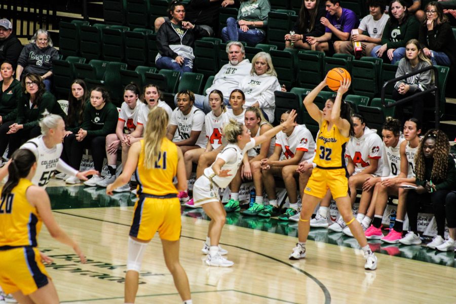McKenna Hofschild gets back on the defensive end for a stop vs Colorado Christian University