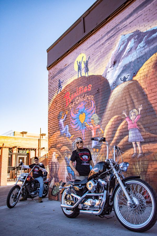 Husband and wife, Werner Schreiber and Heather, showcase their Harley Davidson Evolutions