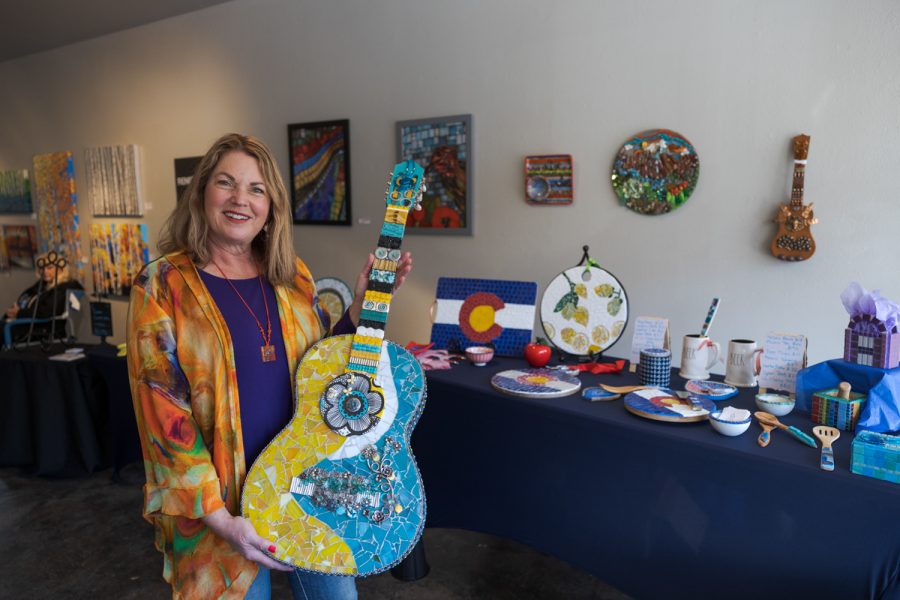 Renee Walkup displays her artwork at the Local Women Artists Market at Art Lab