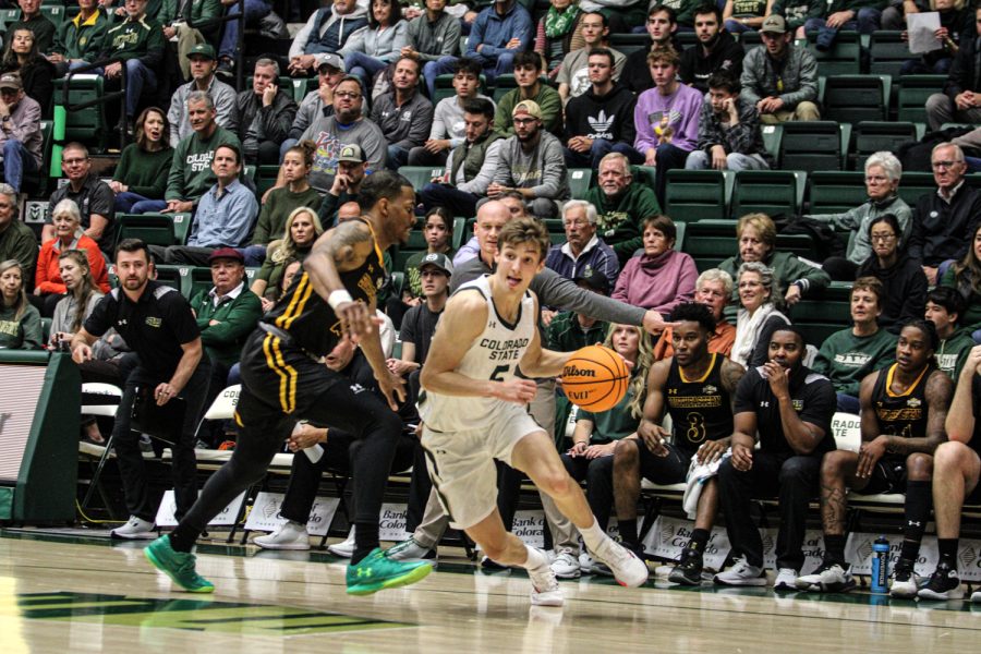 Colorado State guard Baylor Hebb drives to the basket vs a Southeastern Louisiana defender Nov 11.
