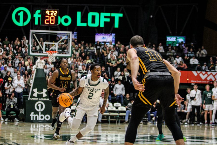 Colorado State guard Tavi Jackson dribbles the ball past half court vs two Southeastern Louisiana defenders Nov. 11.