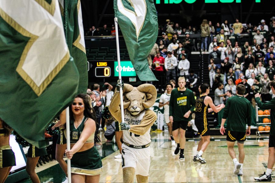 Cam the Ram and the Colorado State cheerleaders run out with the team flags during the men's basketball game against Southeastern Louisiana Nov. 11.