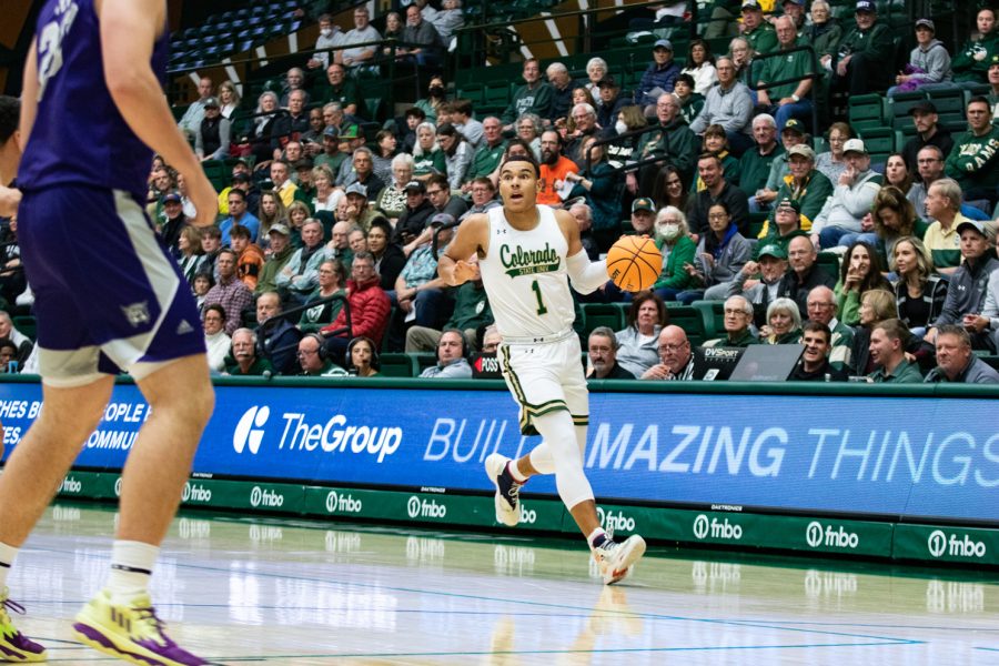 Colorado State guard John Tonje drives the ball up the court against Weber State Nov. 14.