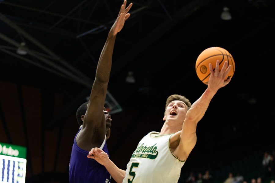 Colorado State guard Baylor Hebb attempts a contest layup against Weber State Nov 14.