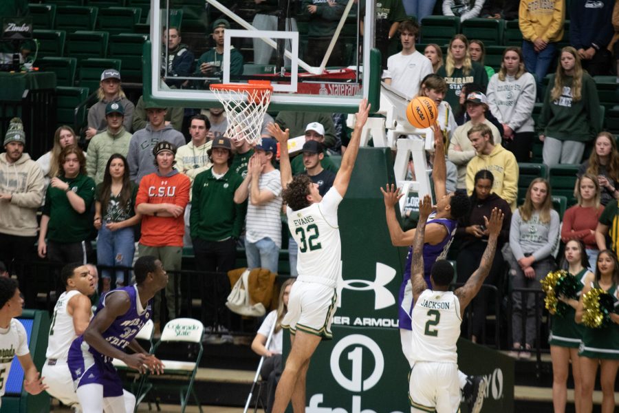 Colorado State forward Kyle Evans jumps up to block a shot by Weber State Nov. 14.