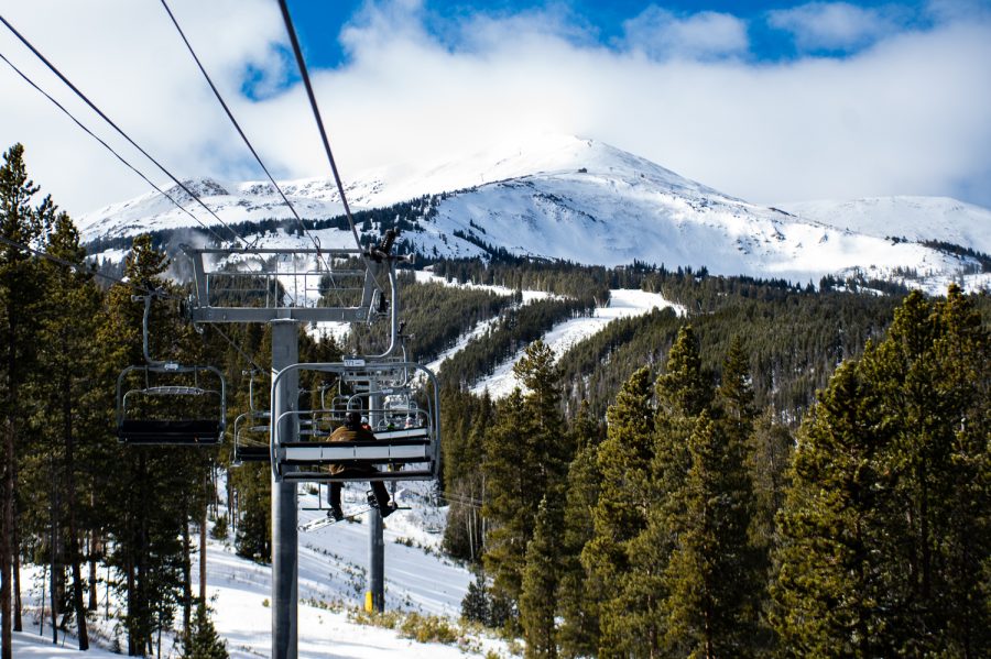 Skiers and snowboarders ride the Peak 8 SuperConnect lift at Breckenridge Ski Resort