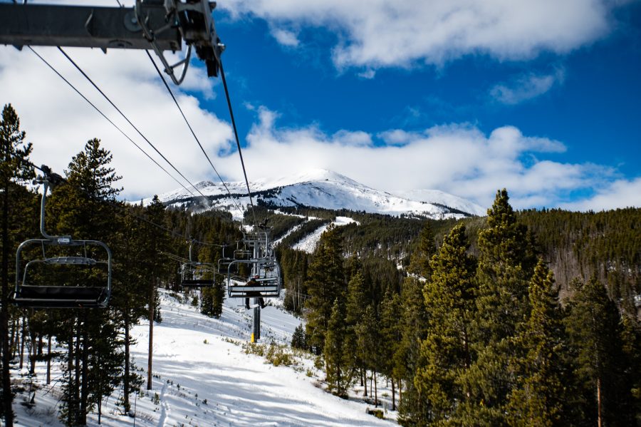 Skiers and snowboarders ride the Peak 8 SuperConnect lift at Breckenridge Ski Resort