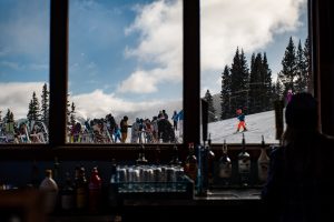 Skiers and snowboarders ride up to the Overlook Restaurant at Breckenridge Ski Resort