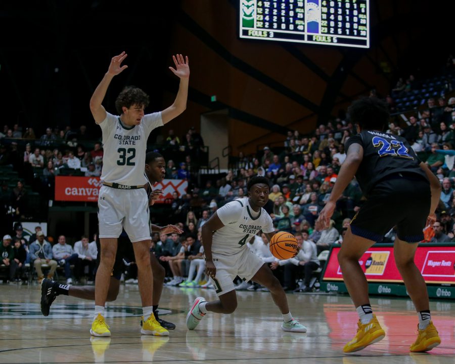 Colorado State University forward Kyle Evans (32) provides a screen for guard Isaiah Stevens (4) to move around a San Jose State University defender at Moby Arena Dec. 31, 2022. The Rams lost 78-70, despite 24 points and 10 assists from Stevens.